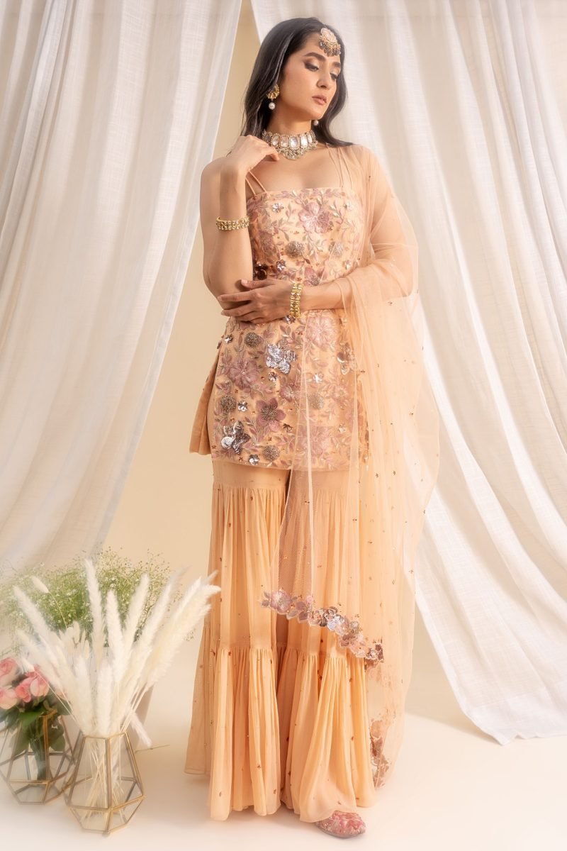 Tiered Beige Color Sharara With Floral Kurti And Dupatta - Image 3