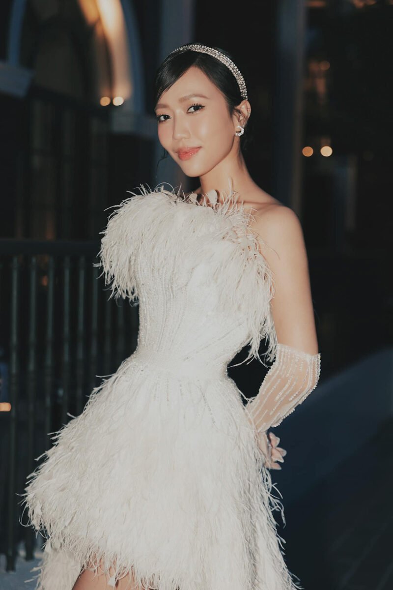 White Feather Embellished Mullet-Style Wedding Gown - Image 4