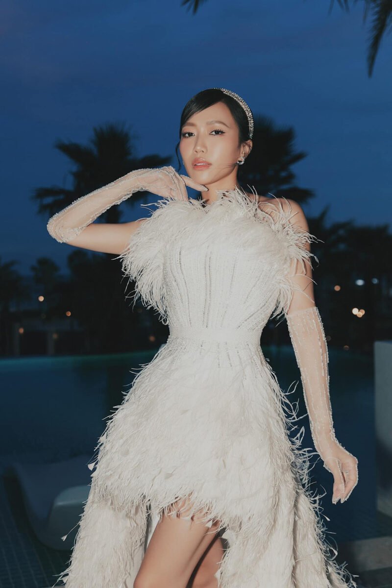 White Feather Embellished Mullet-Style Wedding Gown - Image 2