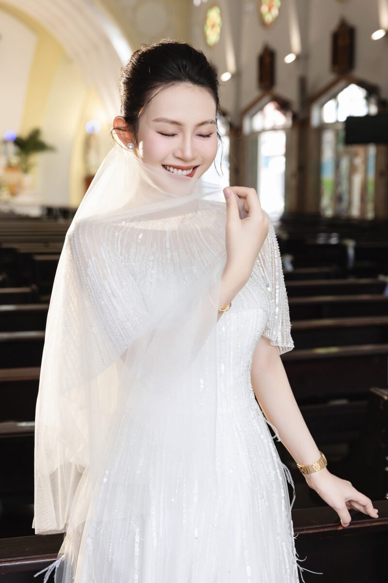 Hand-Embellished Crystal White Bridal Gown with Feather Accents - Image 3