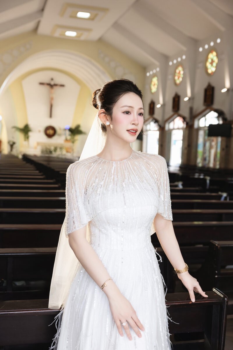 Hand-Embellished Crystal White Bridal Gown with Feather Accents - Image 4