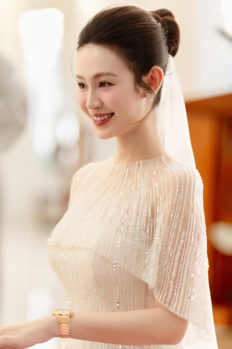Hand-Embellished Crystal White Bridal Gown with Feather Accents - Image 6